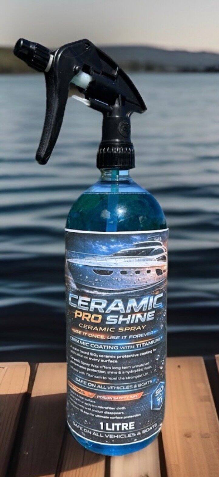 Ceramic Pro Shine ceramic spray wax, 1 litre bottle, on a jetty by the water